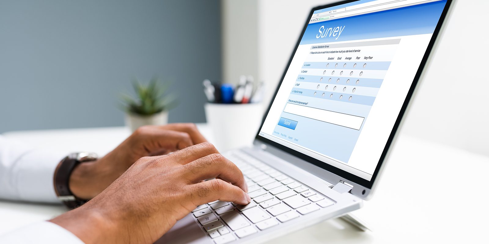 bigstock Man Filling Online Survey Form 387811126