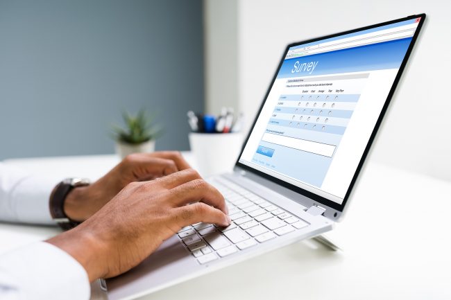 bigstock Man Filling Online Survey Form 387811126 bigstock Man Filling Online Survey Form 387811126