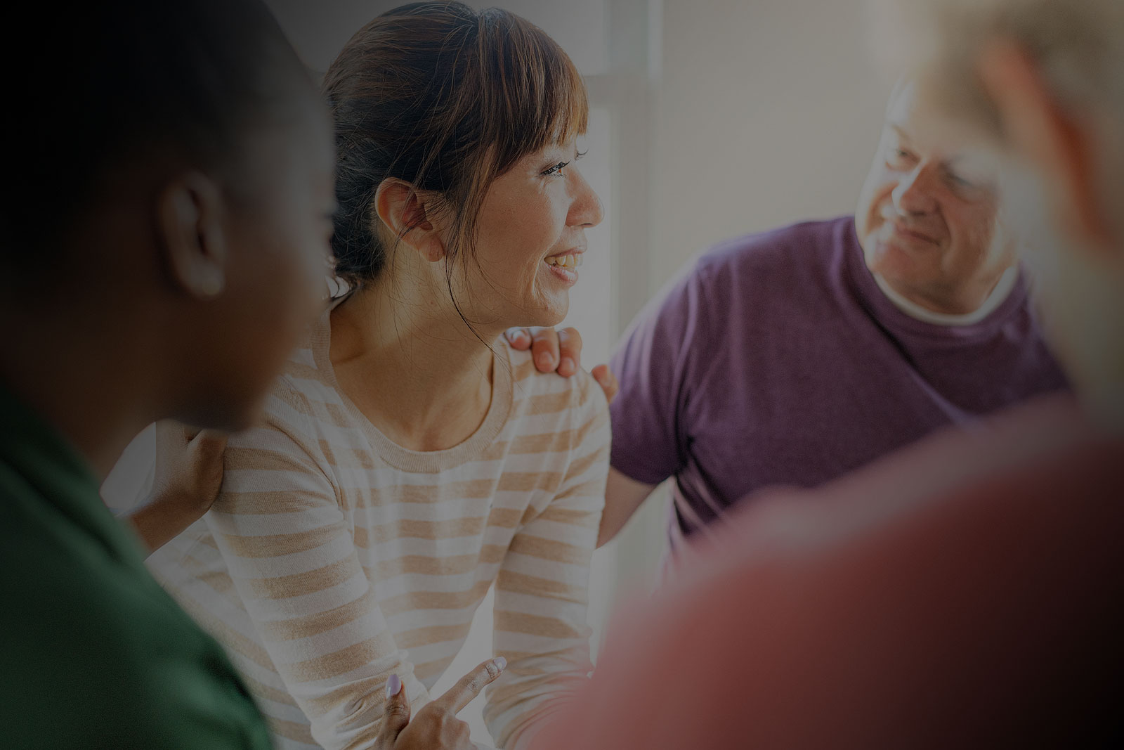 Diverse people in a support group