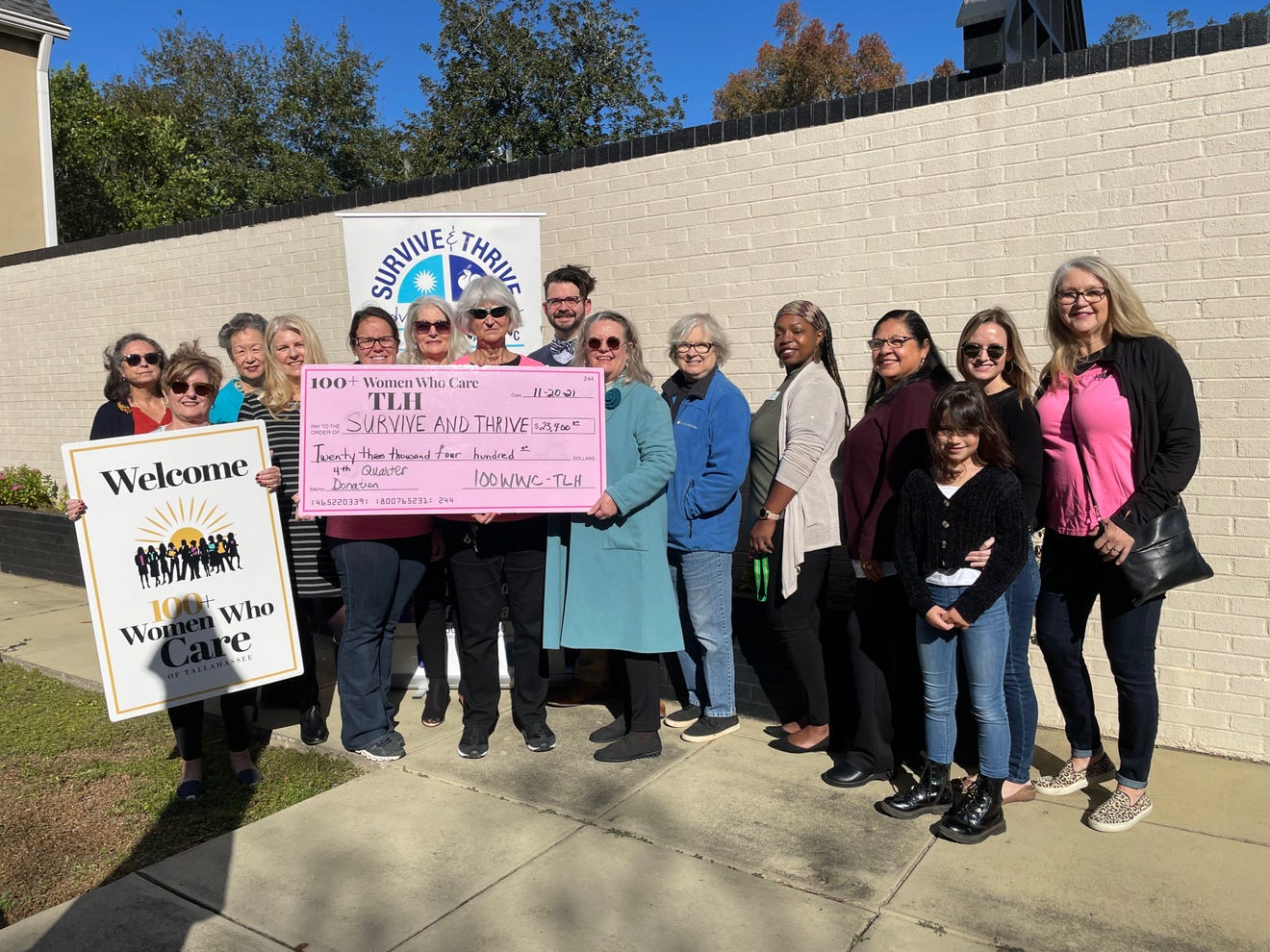 100 women donates 23 k survive and thrive advocacy center